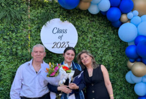 A photo of Nancy and her family at her Year 12 graduation ceremony